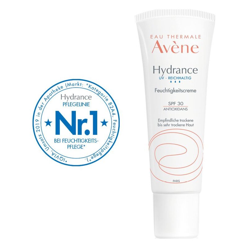 Weiße Tube mit Feuchtigkeitscreme für trockene Haut, SPF 30; aquarellierte Linie und blauer Siegel "Nr. 1 bei Feuchtigkeitspflege".