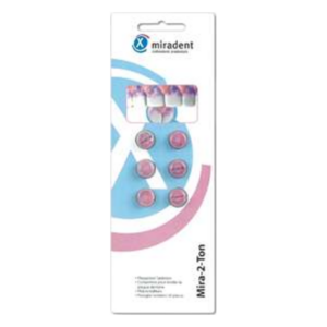 Verpackung mit sechs pinken dentale Indikator-Tabletten auf hellem Hintergrund mit Logo und detaillierter Beschreibung.