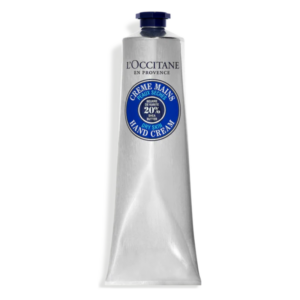 Aluminiumtube mit blauer Etikettierung, enthält Handcreme mit 20% Sheabutter für trockene Haut.