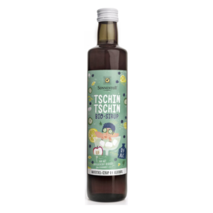 Flasche mit Tschin Tschin Bio-Sirup von Sonnentor, abgebildet auf grünem Etikett mit bunten Illustrationen.