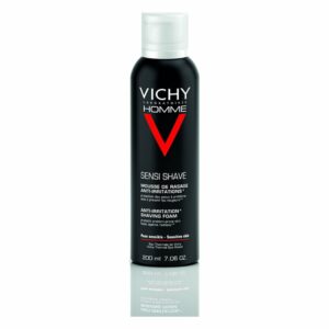 Schwarze Dose mit Rasierschaum für empfindliche Haut, Markierung "Vichy Homme" und Anti-Irritation Hinweis.