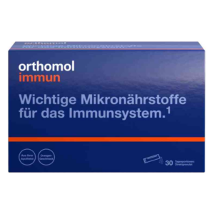 Blaues Kartonpaket von orthomol immun mit der Aufschrift zu Mikronährstoffen für das Immunsystem und orangefarbener Akzentlinie.