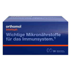 Verpackung von Orthomol Immun, dunkelblauer Karton mit orangefarbener Schrift über Mikronährstoffe für das Immunsystem.