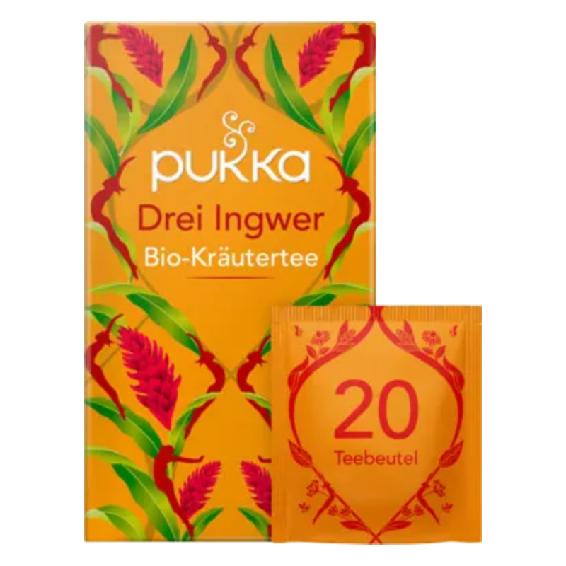 Packung mit Bio-Kräutertee "Drei Ingwer" von Pukka, orange mit Pflanzenmotiven, enthält einen Teebeutel.