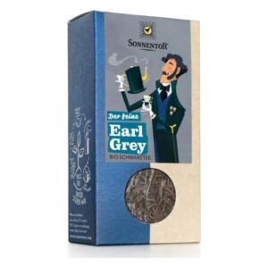 Verpackung von Sonnentor Earl Grey Bio Schwarztee mit illustriertem Mann im Anzug und Sichtfenster für Tee.