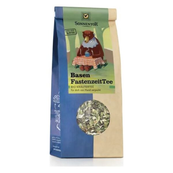 Rechteckige Teeverpackung mit einer transparenten Fensteröffnung, beschriftet mit "Basen FastenzeitTee" von Sonnentor.