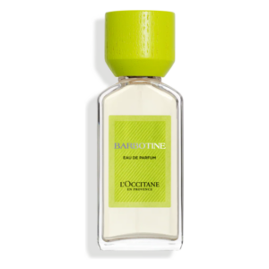 Flasche mit Eau de Parfum 'Barbotine' von L'Occitane, mit grünem Holzverschluss und stilvollem Design.