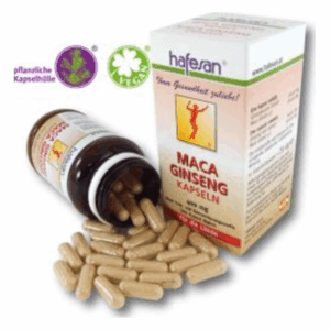 Flasche mit Maca Ginseng Kapseln und Verpackung, vegane, pflanzliche Kapselhülle, Kapseln liegen verstreut auf dem Tisch.