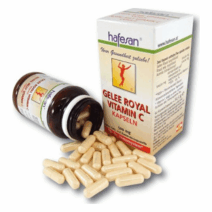 Glasflasche mit Kapseln für Gelee Royale Vitamin C, daneben eine offene Verpackung.