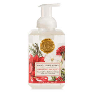 Flüssigseife in einem Pumpbehälter mit floralem Design in Rot und Weiß, Duft von winterlichen Blumen.