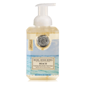 Schaumseife mit Sheabutter in einer transparenten Flasche, mit Strandmotiv und einem Pumpverschluss.