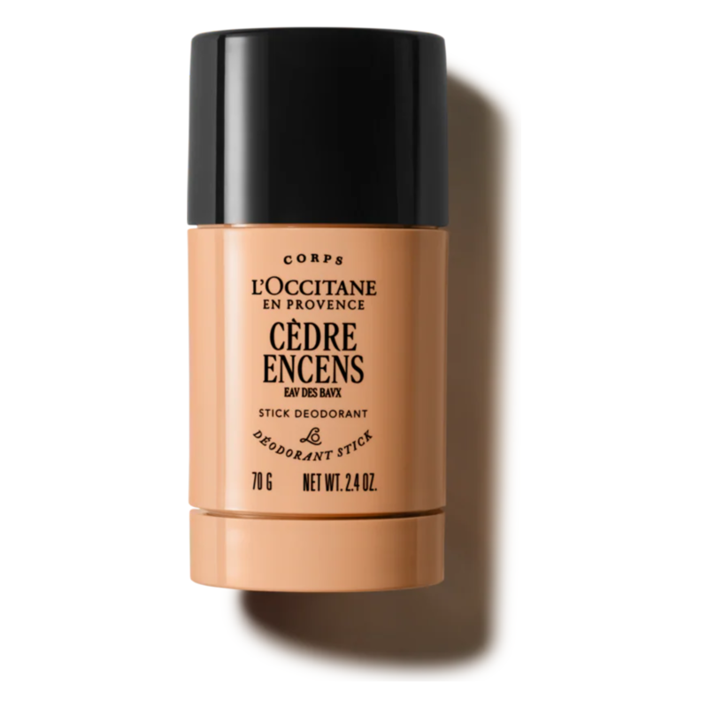 L'Occitane Cèdre Encens Deodorant Stick in einer runden, beige Verpackung mit schwarzem Deckel.