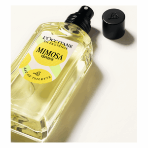 Flasche Eau de Toilette von L'Occitane mit dem Duft Mimosa Verveine, grüner und gelber Etikett.