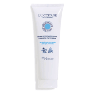 Weiße Tube mit Reinigungscreme von L'Occitane, betont mit blauer Schrift und botanischen Motiven.