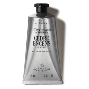 Eine silberne Tube mit schwarzem Deckel, gefüllt mit After-Shave-Balsam von L'Occitane, Etikett in Schwarz und Weiß.