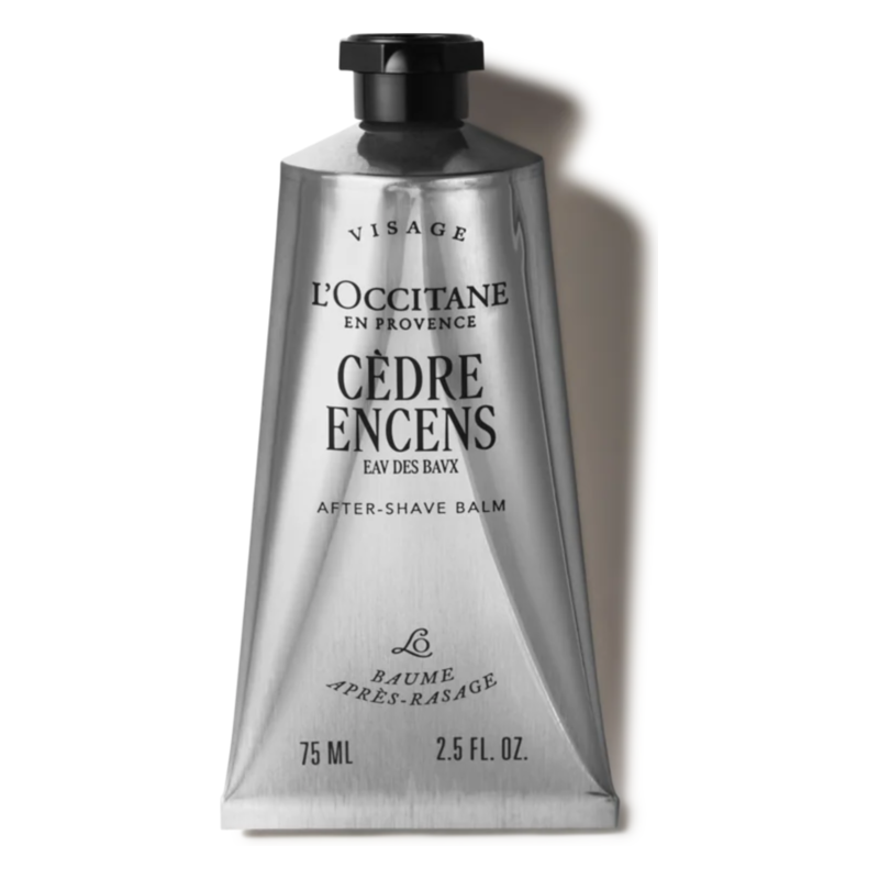 Eine silberne Tube mit schwarzem Deckel, gefüllt mit After-Shave-Balsam von L'Occitane, Etikett in Schwarz und Weiß.