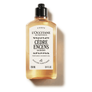 Flasche mit Duschgel von L'Occitane, Duft Cèdre Encens, klare Flüssigkeit, etiketiert mit 250 ml.
