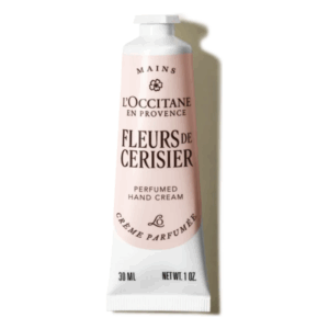 Rosa Tube Handcreme von L'Occitane mit dem Duft von Kirschblüten, 30 ml Inhalt.