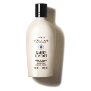 Flasche mit hydrierender Duschcreme von L'Occitane, cremefarben mit schwarzem Deckel, 250 ml.