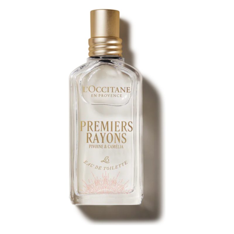 Flasche von L'Occitane mit Eau de Toilette "Premiers Rayons", transparent mit goldener Kappe und Schriftzug.