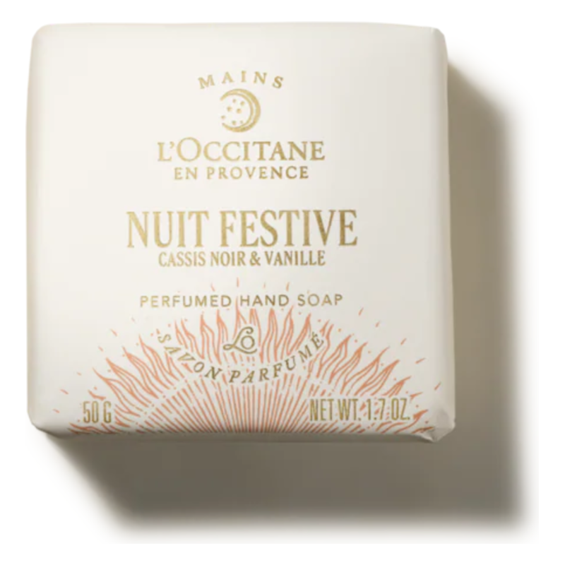 Weiße Handseife von L'Occitane mit Duftnoten von schwarzer Johannisbeere und Vanille, elegant verpackt.