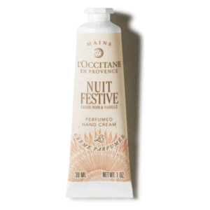Verpackung einer parfümierten Handcreme von L'Occitane mit Noten von schwarzem Johannisbeere und Vanille.
