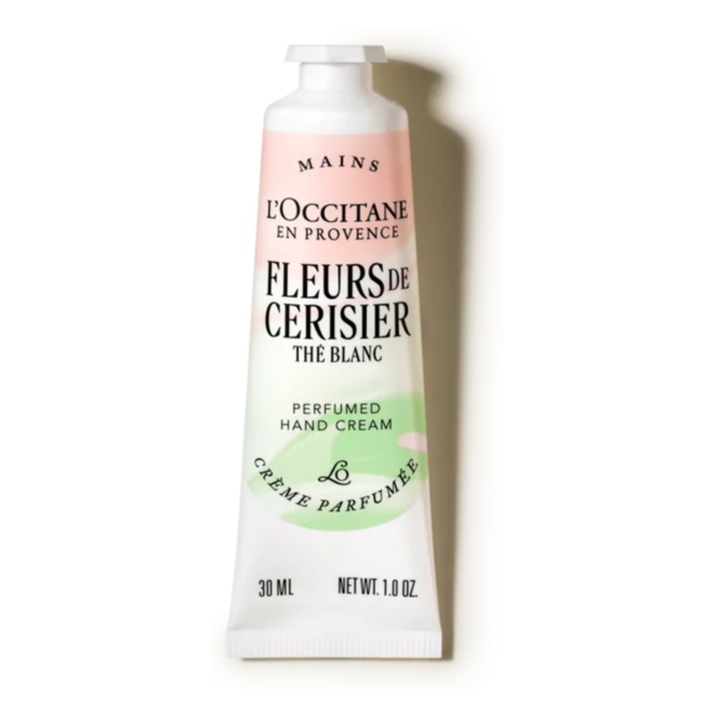 Handcreme in einer schlanken, kunstvoll gestalteten Tube mit floraler und pastellfarbener Hervorhebung