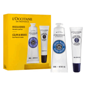 Geschenkset von L'Occitane mit Handcreme und Lippenbalsam in einer gelben Verpackung.