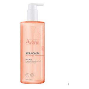 Flasche mit Avène XeraCalm Duschgel für empfindliche, trockene Haut in einem transparenten Behälter mit Spender.