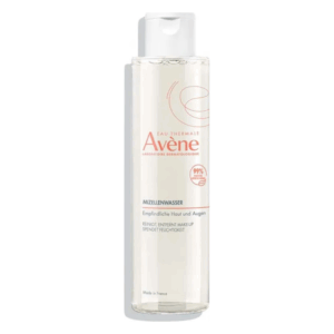 Flasche mit Avène Mizellenwasser für empfindliche Haut, transparent mit Pumpspender und rosa Schriftzug.