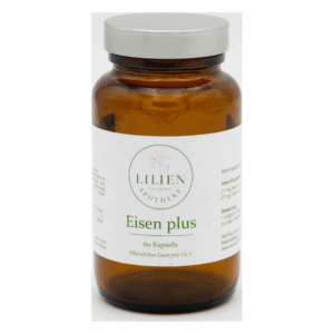 Braune Glasflasche mit Schraubverschluss und Etikett, enthält pflanzliche Eisenkapseln mit Vitamin C.